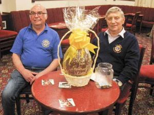 Lion Don and Lion Paul S. selling Easter Egg raffle tickets at Rothwell WMC