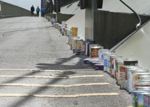 Lined up tins on the bridge