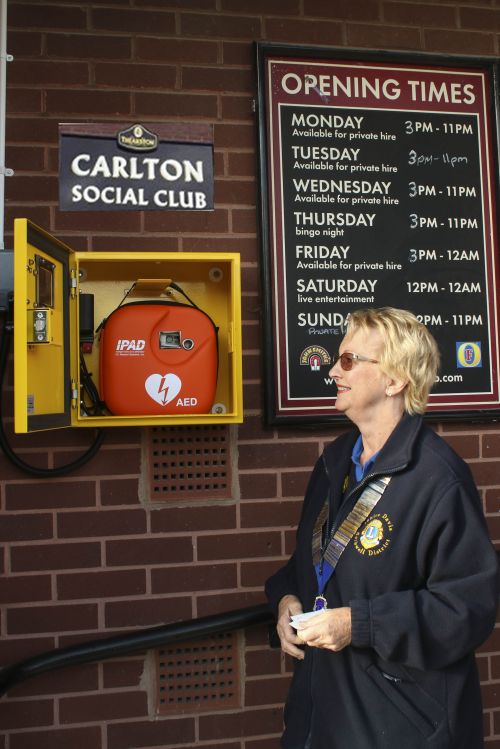 Lion president Janice and the new defibrillator