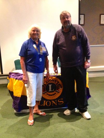 Outgoing Lion President Phil hands over to incoming Lion President Jackie