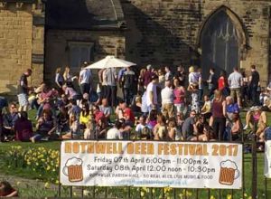 Enjoying the Beer Festival outside in the church grounds